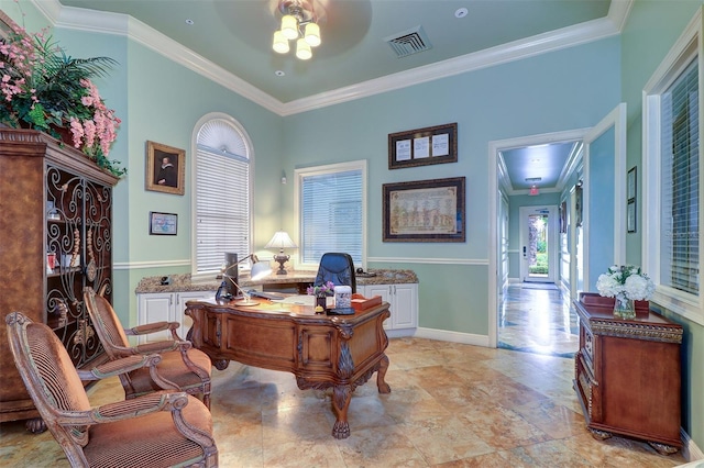 office area featuring a ceiling fan, crown molding, visible vents, and baseboards