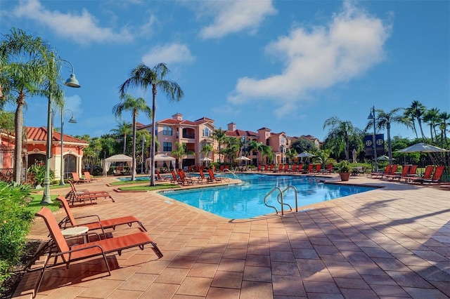 pool featuring a gazebo and a patio area
