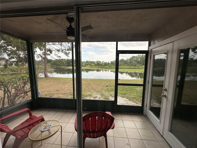 4022 Cortez Dr Unit A, Tampa, FL 33614 - sunroom featuring a water view, a ceiling fan, and a wealth of natural light