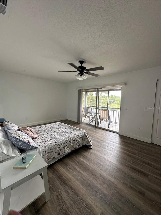 4022 Cortez Dr Unit A, Tampa, FL 33614 - bedroom with access to outside, a textured ceiling, baseboards, and wood finished floors