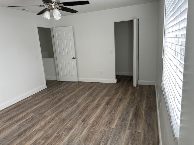 4022 Cortez Dr Unit A, Tampa, FL 33614 - unfurnished bedroom featuring baseboards, ceiling fan, dark wood finished floors, and visible vents