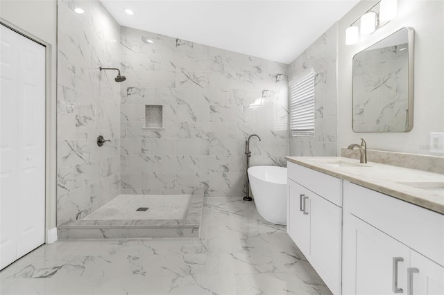 bathroom featuring a freestanding bath, vanity, tiled shower, and marble finish floor