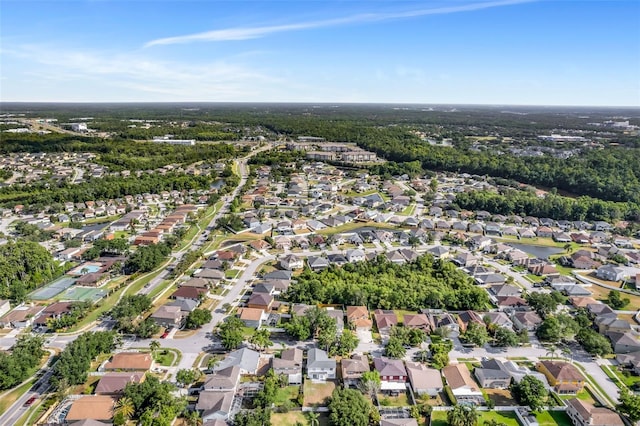 birds eye view of property with a residential view
