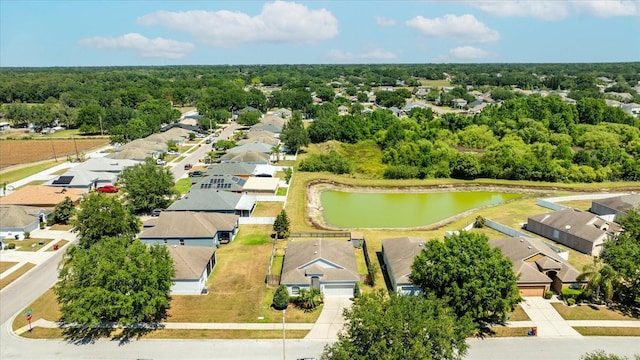 aerial view featuring a water view and a residential view