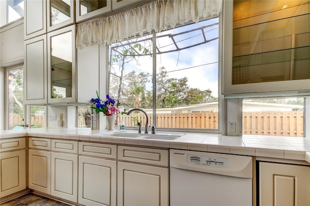 919 Sandpiper Way S, Saint Petersburg, FL 33707 - bar with a sink and white dishwasher