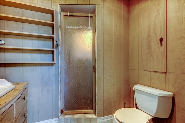 919 Sandpiper Way S, Saint Petersburg, FL 33707 - full bathroom with vanity, toilet, wooden walls, and a shower stall
