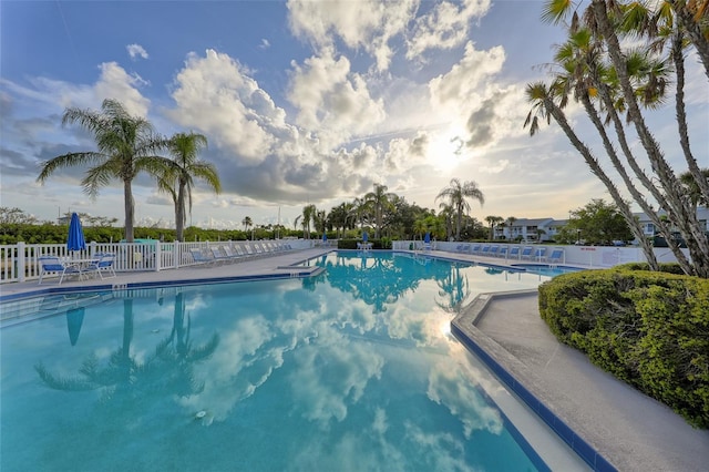 community pool featuring fence