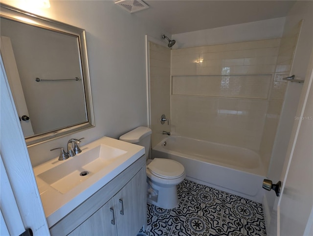 full bathroom with toilet, vanity, tile patterned floors, and shower / bath combination