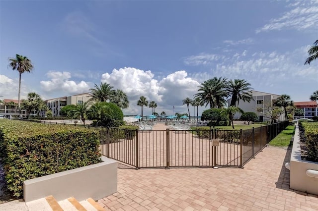 view of patio featuring fence