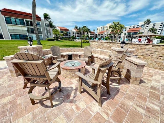 view of patio / terrace featuring a fire pit