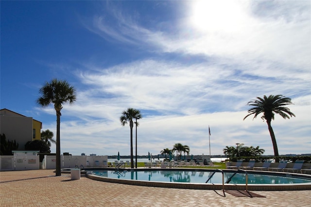community pool with a patio