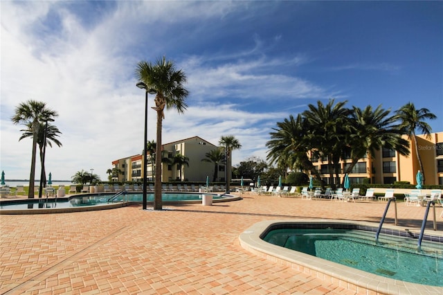 community pool with a patio