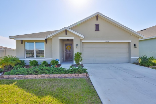 ranch-style home with concrete driveway, stucco siding, a front yard, and a garage