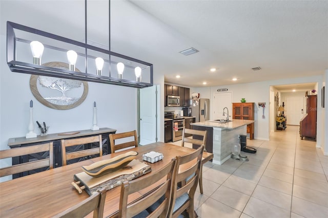 dining space with visible vents, baseboards, light tile patterned flooring, and recessed lighting