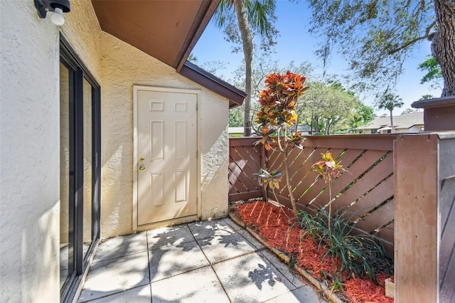 2953 Yucca Ct, Palm Harbor, FL 34684 - property entrance featuring stucco siding and fence