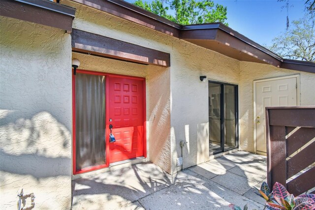 2953 Yucca Ct, Palm Harbor, FL 34684 - entrance to property with stucco siding