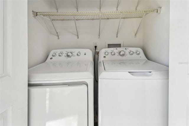 2953 Yucca Ct, Palm Harbor, FL 34684 - laundry area with separate washer and dryer