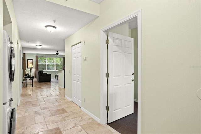 3506 54th Dr W Unit 108, Bradenton, FL 34210 - hallway featuring baseboards and stone tile flooring