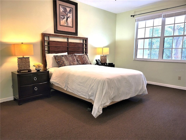 3506 54th Dr W Unit 108, Bradenton, FL 34210 - carpeted bedroom with baseboards