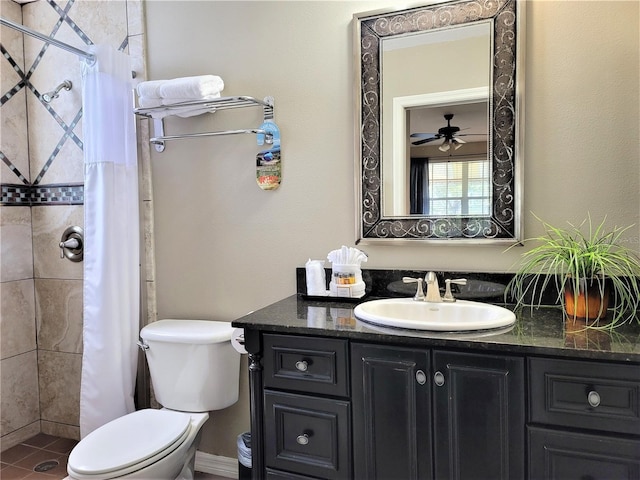 3506 54th Dr W Unit 108, Bradenton, FL 34210 - full bath with vanity, toilet, tile patterned floors, a ceiling fan, and tiled shower