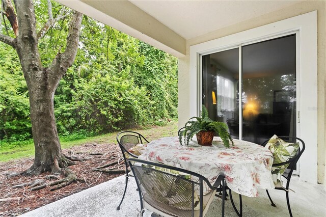 3506 54th Dr W Unit 108, Bradenton, FL 34210 - view of patio with outdoor dining space