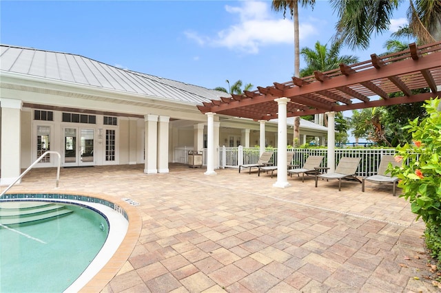 3506 54th Dr W Unit 108, Bradenton, FL 34210 - view of pool featuring fence, a pergola, french doors, a swimming pool, and a patio