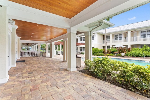 3506 54th Dr W Unit 108, Bradenton, FL 34210 - view of patio / terrace featuring an outdoor pool