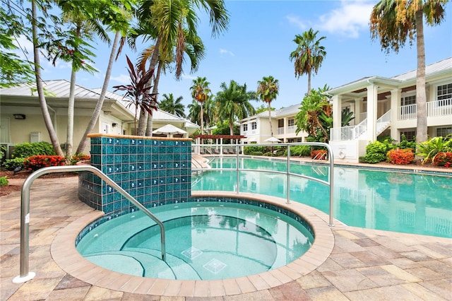3506 54th Dr W Unit 108, Bradenton, FL 34210 - community pool with stairs and a community hot tub