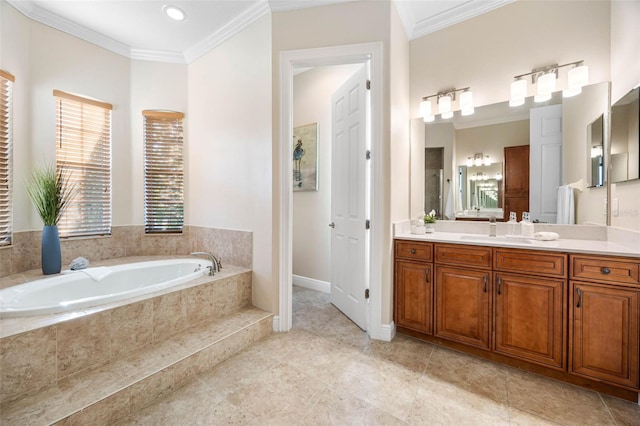 full bathroom featuring tile patterned floors, a garden tub, vanity, and ornamental molding