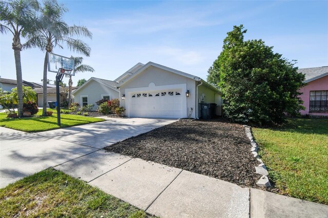 3238 Cullendale Dr, Tampa, FL 33618 - ranch-style house featuring a garage, stucco siding, concrete driveway, and a front yard