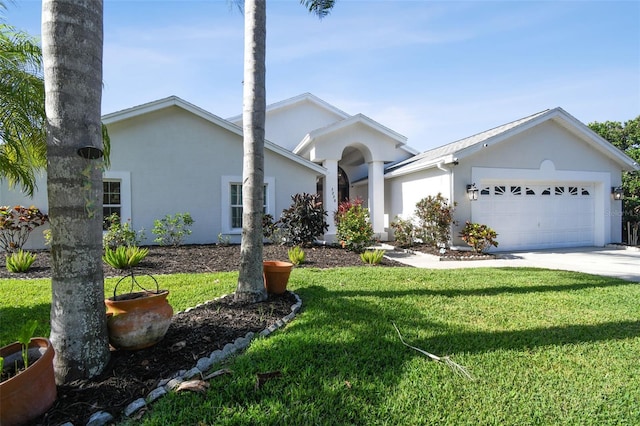 3238 Cullendale Dr, Tampa, FL 33618 - ranch-style home featuring a garage, stucco siding, concrete driveway, and a front lawn