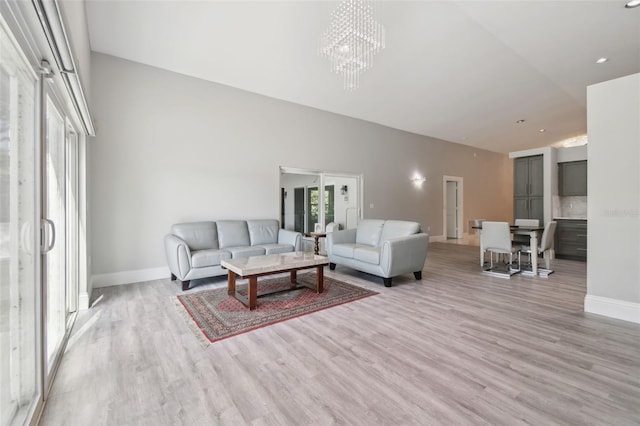 3238 Cullendale Dr, Tampa, FL 33618 - living area with baseboards, recessed lighting, light wood-style floors, and a chandelier