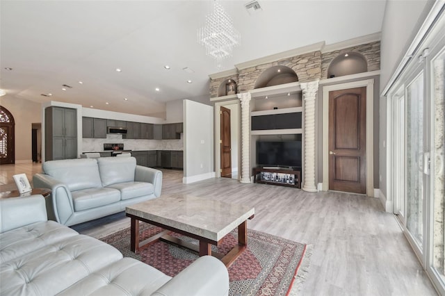 3238 Cullendale Dr, Tampa, FL 33618 - living area featuring visible vents, recessed lighting, light wood-style flooring, and a chandelier