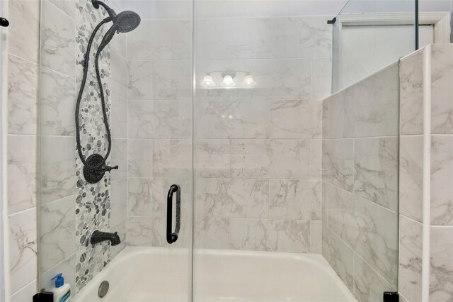 3238 Cullendale Dr, Tampa, FL 33618 - bathroom featuring shower / bath combination with glass door