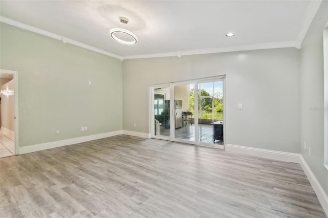 3238 Cullendale Dr, Tampa, FL 33618 - spare room featuring crown molding, baseboards, and wood finished floors