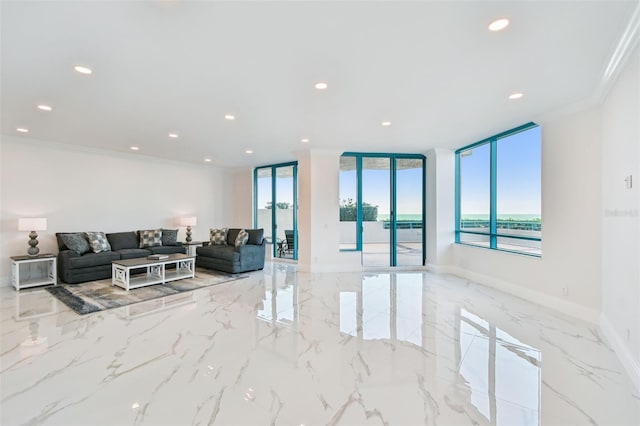 living area with crown molding, recessed lighting, and marble finish floor