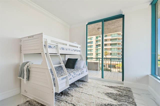 bedroom featuring crown molding, marble finish floor, multiple windows, and access to exterior