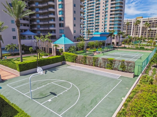 view of sport court with fence