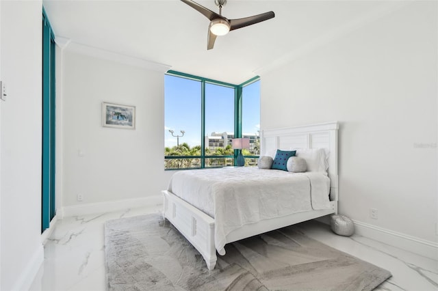 bedroom featuring expansive windows, marble finish floor, ceiling fan, and baseboards