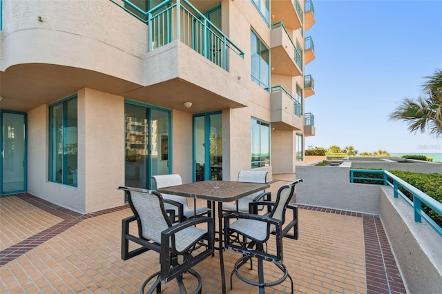 view of patio / terrace with a balcony