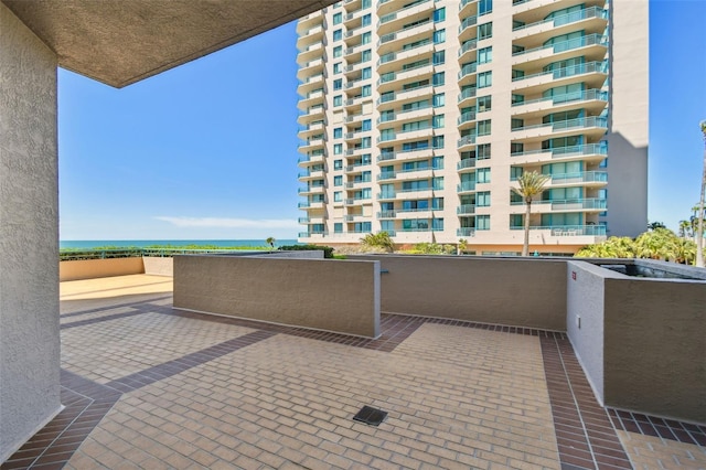 view of patio with a balcony