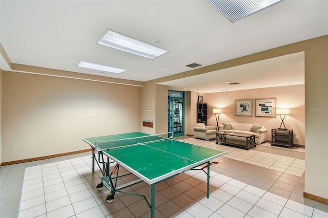 recreation room with light tile patterned floors, baseboards, and visible vents