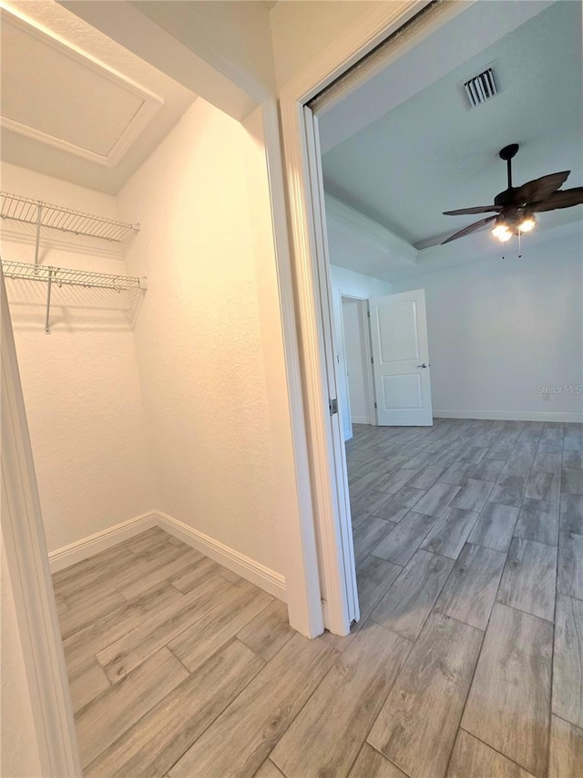 11240 Marvelwood, Brooksville, FL 34614 - interior space featuring light wood-style flooring, baseboards, and visible vents