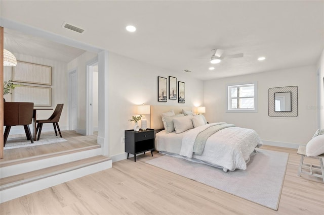 1443 Paloma Ln, Dunedin, FL 34698 - bedroom with light wood-style flooring, baseboards, recessed lighting, and ceiling fan