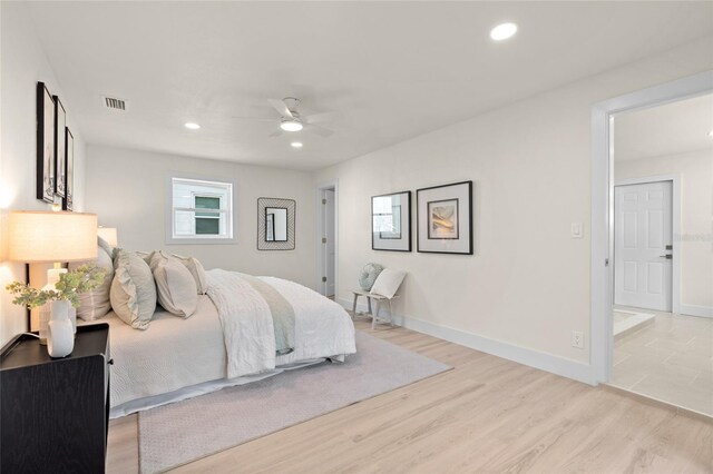 1443 Paloma Ln, Dunedin, FL 34698 - bedroom featuring light wood-type flooring, baseboards, recessed lighting, and a ceiling fan