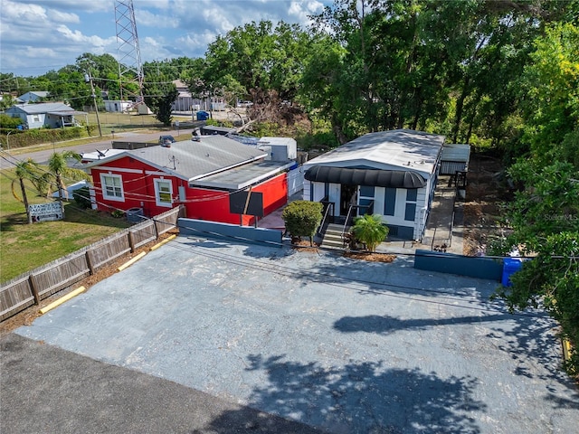 126 Ridgewood Ave, Brandon, FL 33510 - view of front facade featuring uncovered parking and fence