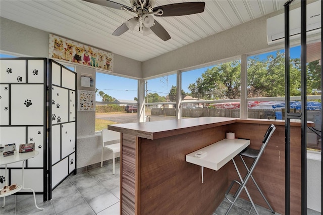126 Ridgewood Ave, Brandon, FL 33510 - sunroom / solarium with outdoor dry bar, a ceiling fan, and a wall mounted AC