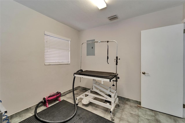 126 Ridgewood Ave, Brandon, FL 33510 - exercise room featuring electric panel and visible vents