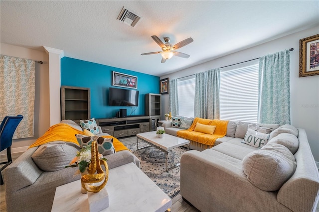5538 Spanish Moss Cv, Bradenton, FL 34203 - living room with ceiling fan and wood finished floors