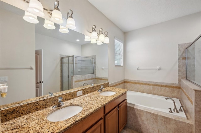 12831 White Bluff Rd, Hudson, FL 34669 - bathroom featuring a shower stall, a bath, and double vanity